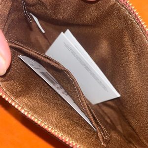 Small coach wristlet